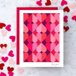 Heart-pattern greeting card with pink and red hearts