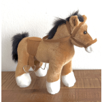 Plush toy horse with a brown saddle and black mane