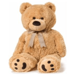 Teddy bear plush with a ribbon bow