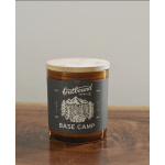 Amber candle in a glass jar with a wooden lid