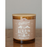 Amber candle in a glass jar with a wooden lid