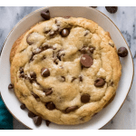 Chocolate chip cookie on a white plate