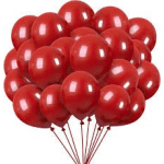 Cluster of red balloons with strings attached