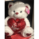 White teddy bear holding a red heart with "Te Amo" text