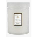 White scented candle in a textured glass jar with a lid
