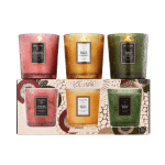 Three scented candles in textured glass jars with a matching gift box.