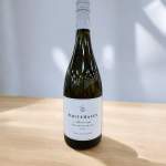 Bottle of Whitehaven Sauvignon Blanc on a wooden table