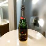 Bottle of Mumm sparkling brut prestige on a table