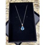Blue teardrop pendant necklace in a black gift box