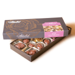 Box of milk chocolates with the lid partly open