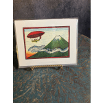 Framed print of a hot air balloon and mountain scene