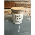 Birthday candle in a glass jar with a bamboo lid