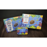 Ocean-themed watercolor coloring books and a paint tin on a table