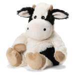Plush black-and-white cow stuffed animal sitting upright