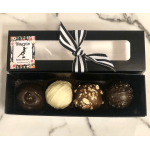 Box of four assorted chocolate truffles with a ribbon