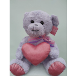 Lavender plush teddy bear holding a pink heart