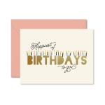 Birthday greeting card with candles and a pink envelope