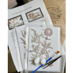 Pressed flower craft kits with cards, tools, and dried floral pieces