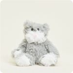 Gray and white plush cat sitting against a plain background