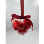 Heart-shaped chocolate gift box with a red ribbon bow