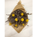 Bundle of dried purple flowers with yellow pom-pom blooms wrapped in burlap