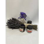 Bundle of dried lavender with three black-lidded jars and a purple sachet