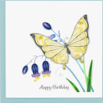 Butterfly-themed birthday card with quilled paper flowers