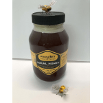 Jar of local honey with two decorative bee figurines