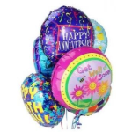 Cluster of colorful round mylar balloons with celebratory messages