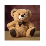 Small tan teddy bear with a dark bow tie sitting upright on a surface