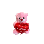 Pink teddy bear holding a red heart pillow