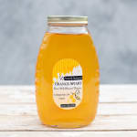 Jar of wildflower honey with a metal lid and label