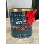Tin of dark chocolate covered mint cookies with a red bow