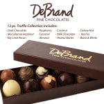 Box of assorted truffles with the lid partially open