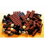 Assorted chocolates and truffles arranged on a surface