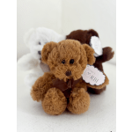 Three plush teddy bears with ribbon bows on a white background