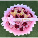 Pink and red rose bouquet with butterfly decorations and a Happy Birthday ribbon