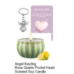 Angel keyring, heart-shaped rose quartz, and a scented candle with lemon