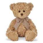 Plush teddy bear with a checkered bow