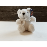 White plush teddy bear with a satin bow