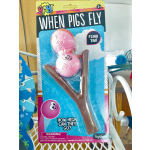 Packaged pig-themed toy slingshot with two pink pig balls
