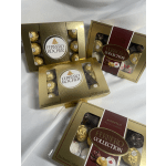 Boxes of Ferrero Rocher chocolates on white fabric