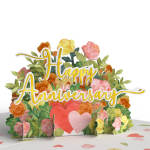 Paper anniversary sign with floral cutouts and two hearts