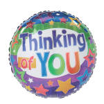 Round foil balloon with colorful stars and the words "Thinking of You"