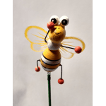 Decorative bee figurine on a green stem with yellow wings