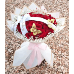 Red rose bouquet with white ribbon, butterflies, and a crown topper