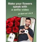 Red roses beside a smartphone showing a smiling man on screen