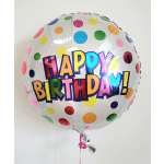 Round birthday balloon with colorful polka dots and "HAPPY BIRTHDAY!" text