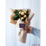 Bouquet of Ferrero Rocher chocolates wrapped in brown paper