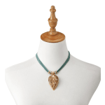 Leaf pendant necklace on a white display bust
